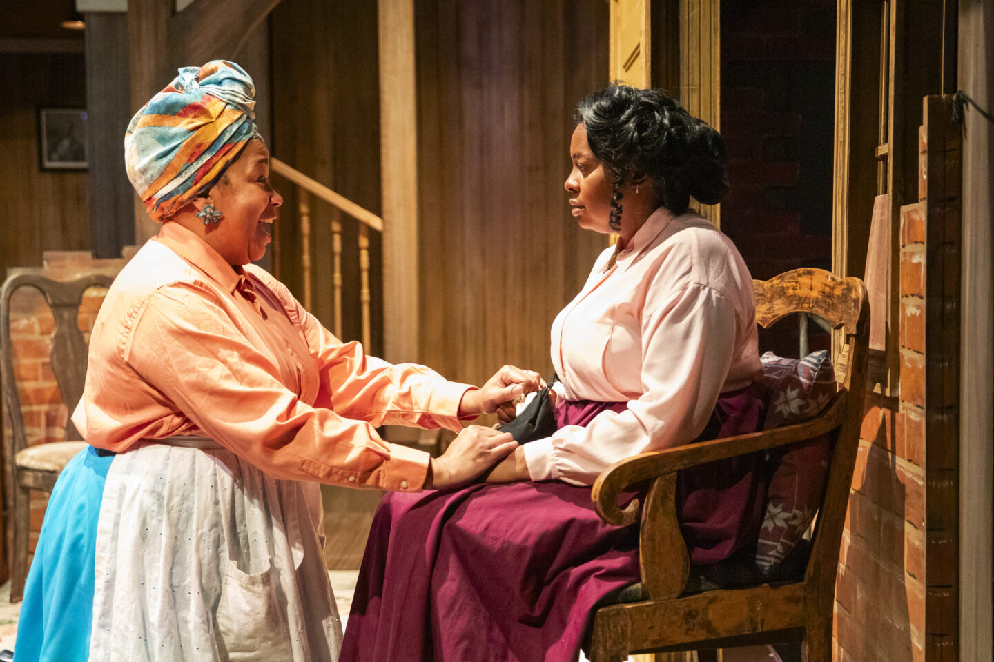 Ramona Lisa Alexander (Bertha Holly) and Ashlee Radney (Mattie Campbell) in Portland Playhouse's 2025 production of 'Joe Turner's Come and Gone'; photo by Julia Varga