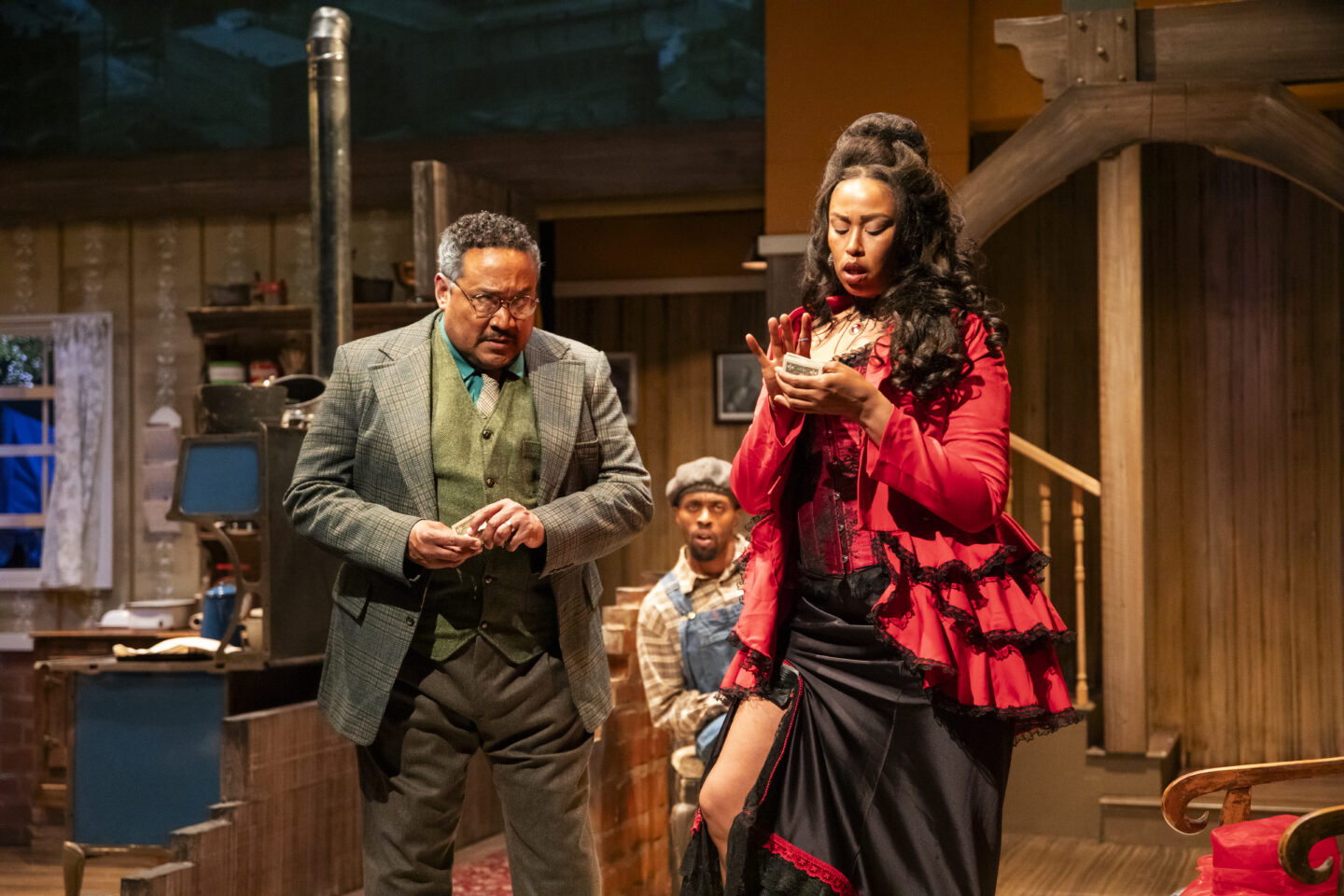 Bobby Bermea (Seth Holly) and Tessa May (Molly Cunningham), with Xzavier Beacham (Jeremy Furlow) looking on in Portland Playhouse's 2025 production of 'Joe Turner's Come and Gone'; photo by Julia Varga